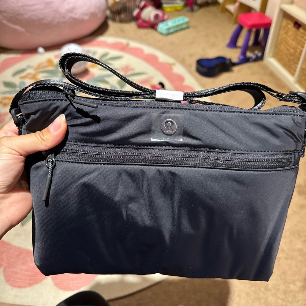 lululemon athletica new parent sling Black crossbody Bag